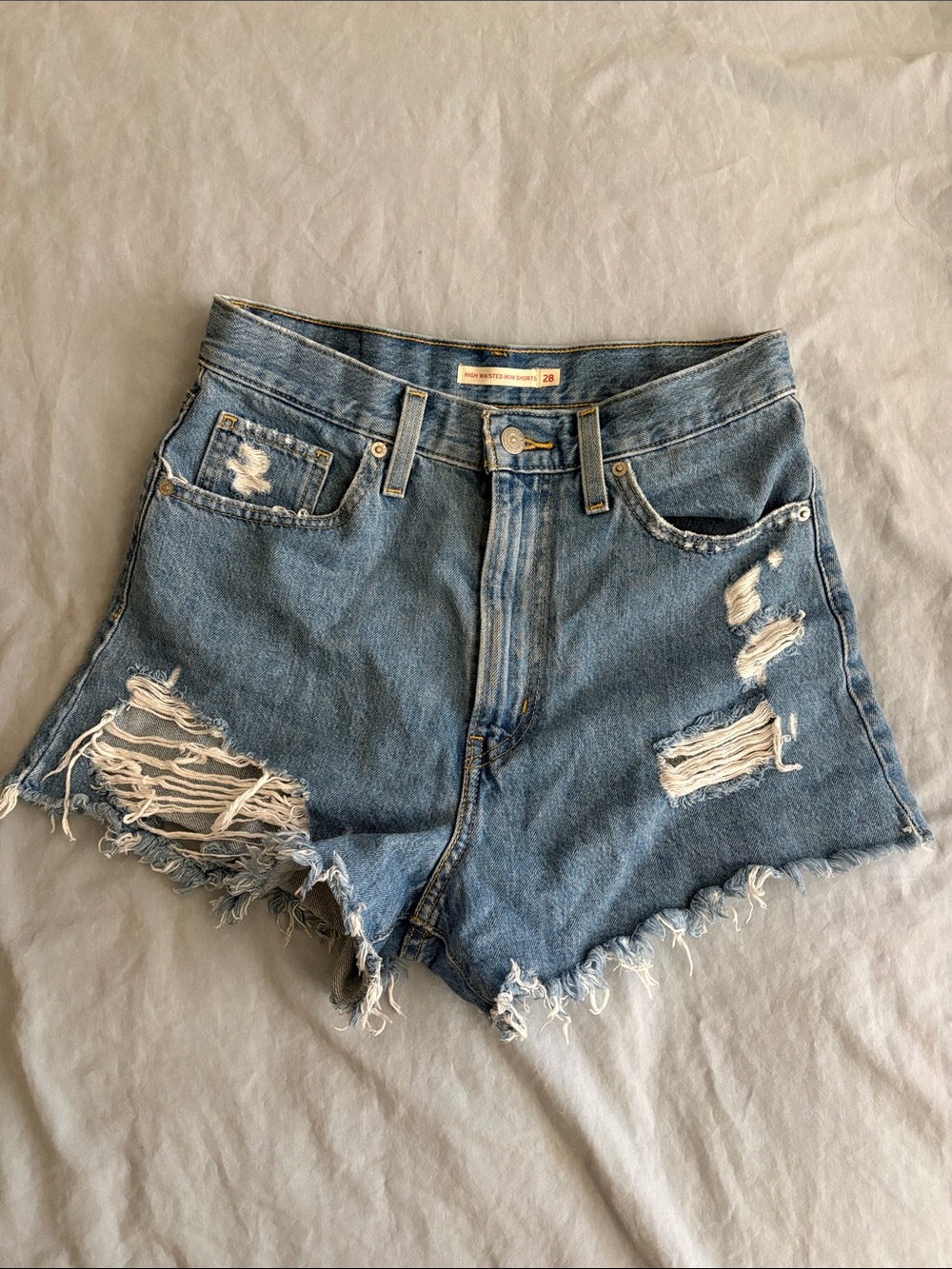 Levi’s High-Rise Distressed Denim Shorts - Blue
